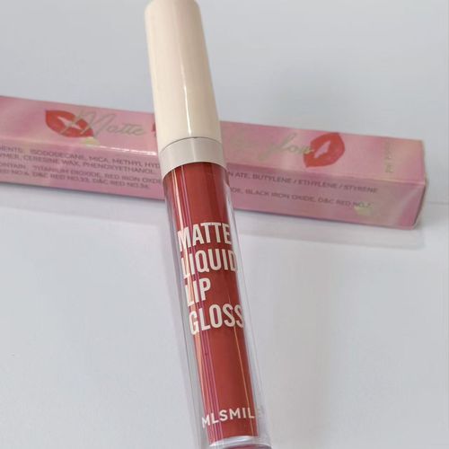 Lip gloss with packaging on a white background